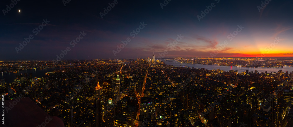 Fototapeta premium New York Manhattan skyline top view during autumn sunset with amazing colors and sights of skyscrapers