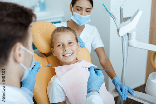 Modern dental examination and oral cavity treatment in children