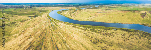 Rechytsa, Gomel Region, Belarus. Aerial View Of Dnieper River. Sky Above Green Meadow And River Landscape. Top View Of European Nature From High Attitude In Summer. Bird's Eye View photo