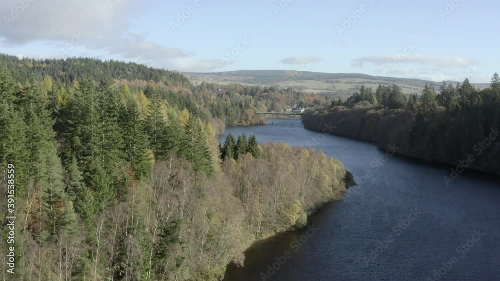 An aerial view of River Tummel on a sunny autumn day, Perthshire, Scotland. Flying down the river towards Pitlochry. An aerial view of River Tummel on a sunny autumn day, Perthshire, Scotland. Flying down the river towards Pitlochry.