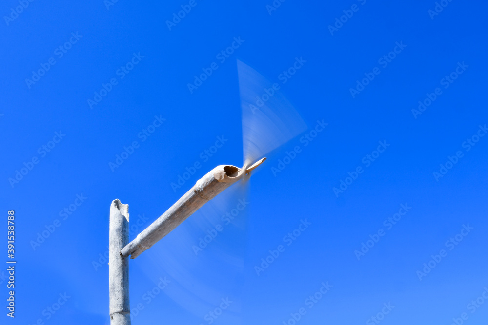 Fototapeta premium Bamboo pinwheel spinning with the wind
