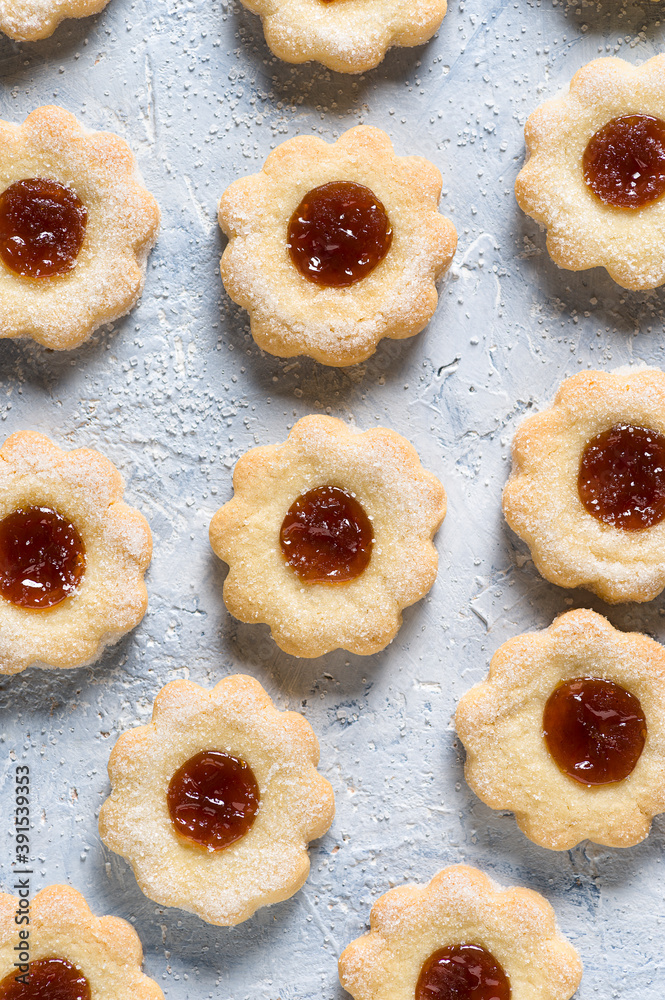 Homemade butter cookies with apricot jam. Top view.