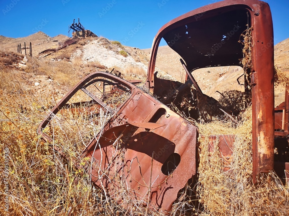 rusty truck wreck on the old mining island of Serifos, Greece
