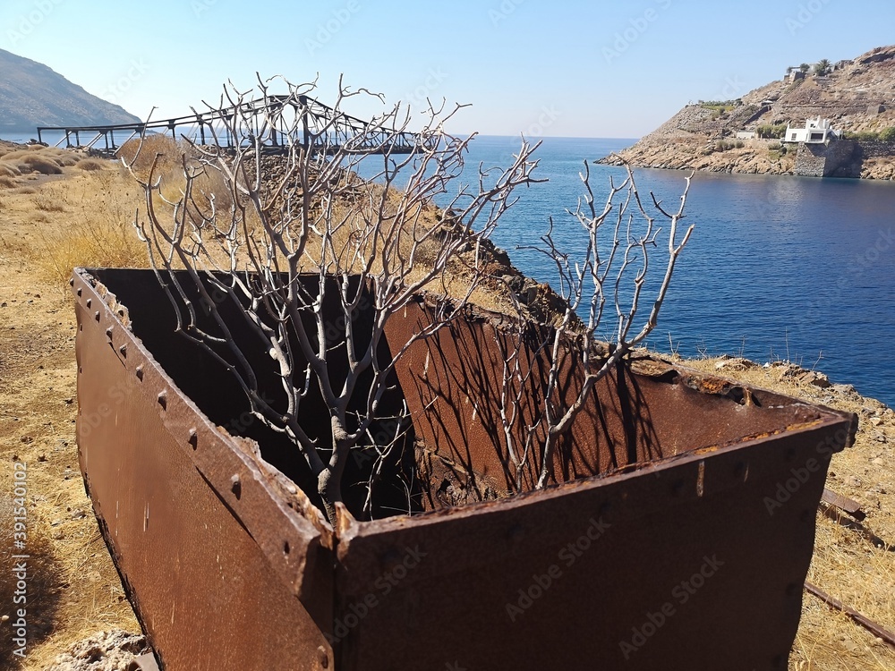 rusty old mining cart on the island of Serifos, Greece