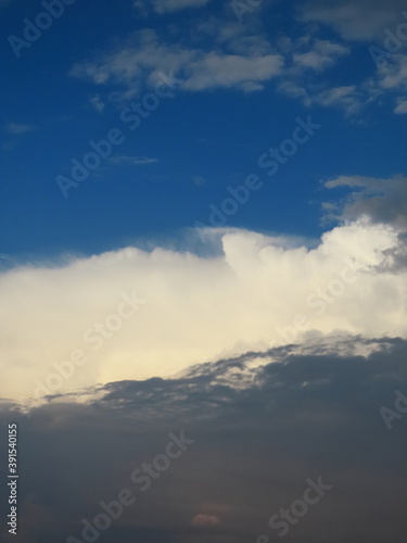 Beautiful multi-colored sky with a cloud before a thunderstorm and rain in autumn in Israel close-up. The photo can be used as a banner for advertising. There is room for text.