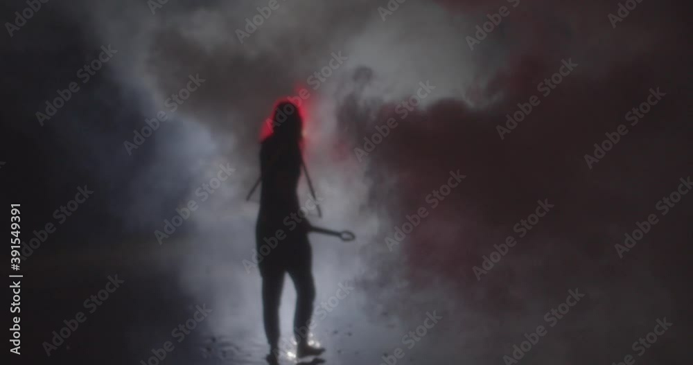 Musician with electric guitar at night in smoke Musician with electric guitar at night in smoke