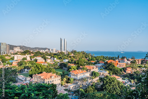 Sunny scenery of twin towers and Gulangyu in Xiamen, Fujian, China