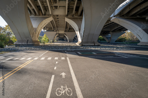 Obraz na płótnie The blacktop playgrounds and bike paths found under the Woodrow Wilson Bridge in Alexandria Virginia, at Jones point Park