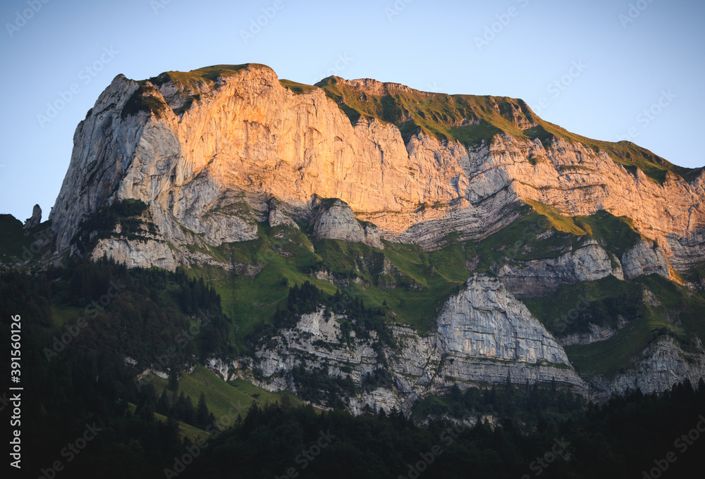 sunset in the swiss alps over a mountain