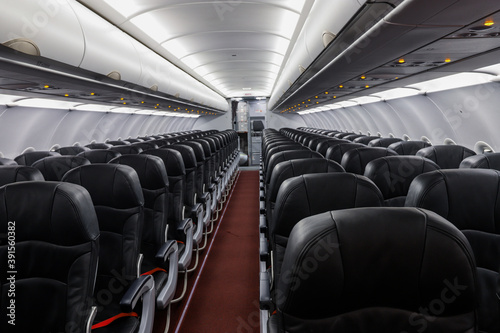 Empty airplane seats in the cabin