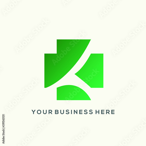 Medical cross logo.Healthcare and medicinal sign.Green icon isolated on light color background.First aid geometric symbol for medics, doctors and pharmacy.