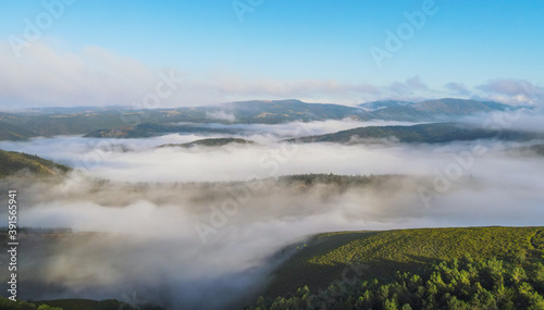 Spanish moutains in the middle of the morning mist © Xavier