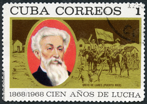 CUBA - 1968: shows portrait of Ramon Emeterio Betances y Alacan (1827-1898), horsemen and flag, Cuban War of Independence, 1968 photo
