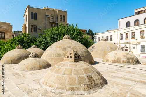 Принти на полотні Domes on on the roof of disused medieval Gasim bey hamam bathhouse in the Icheri