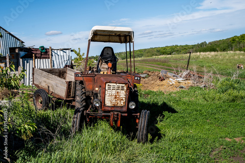 old tractor with a cart