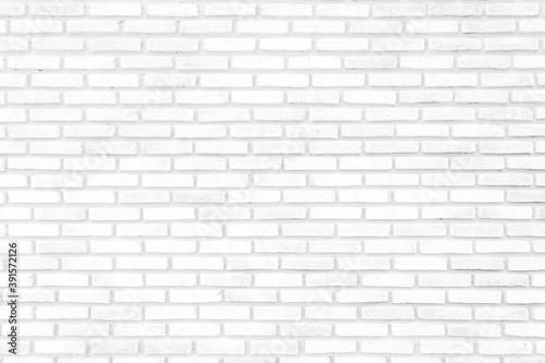 White brick walls that are not plastered background and texture. The texture of the brick is white. Background of empty white tile ceramic wall.