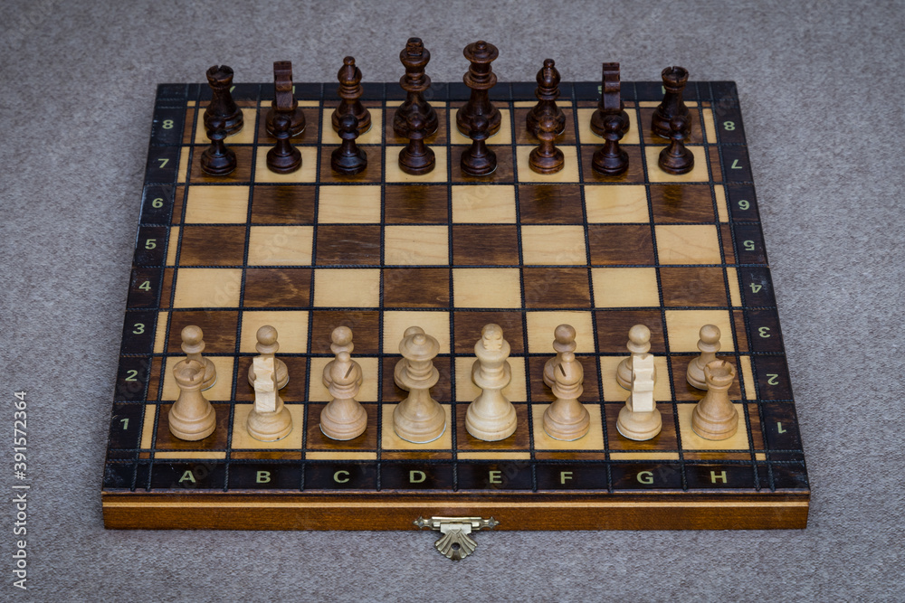 A wooden chess board with pawns A wooden chess board with pawns