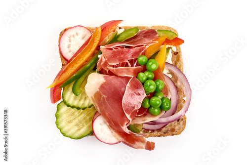 Prosciutto sandwich, close-up, isolated on white background