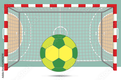 handball ball in front of goal posts with aerial view of court in background