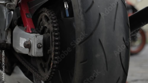 A group of bikers gets on motorcycles and starts the journey