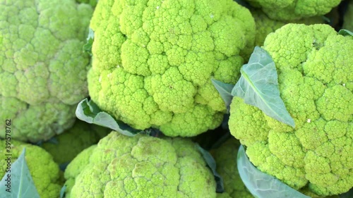 Fresh green cauliflower on a market stall