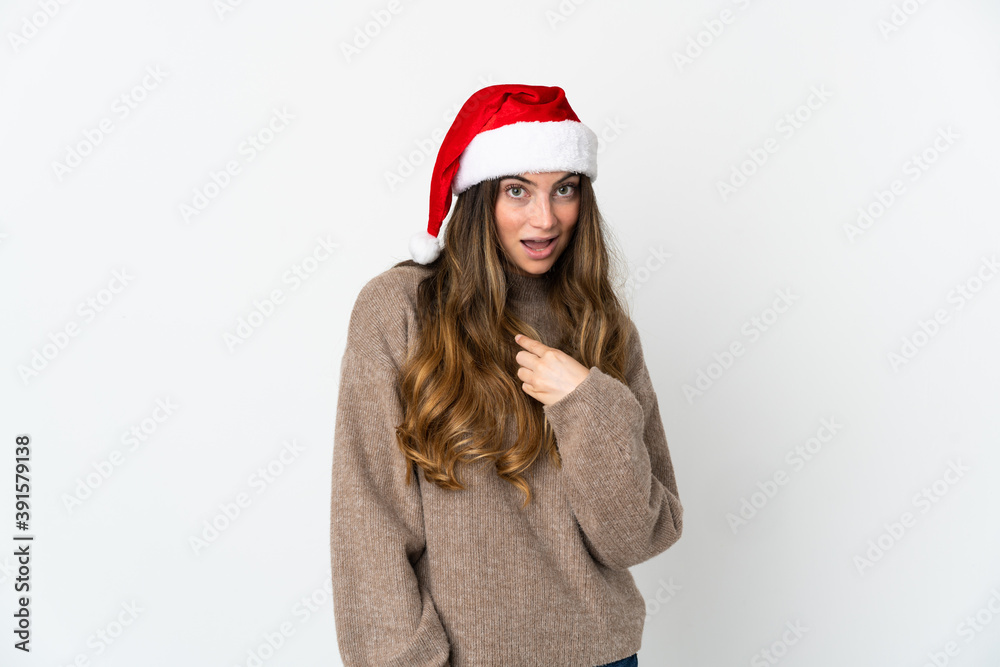 Caucasian girl with christmas hat isolated on white background with surprise facial expression Caucasian girl with christmas hat isolated on white background with surprise facial expression