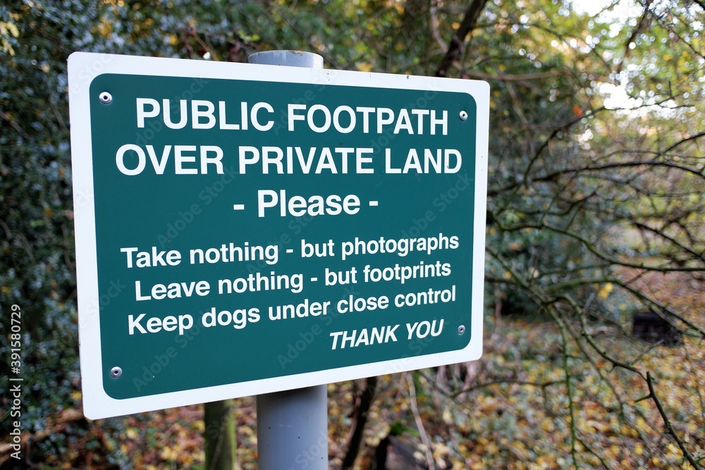 Sign saying public footpath over private land, please take nothing but photographs, leave nothing but footprints, keep dogs under close control, thank you Sign saying public footpath over private land, please take nothing but photographs, leave nothing but footprints, keep dogs under close control, thank you