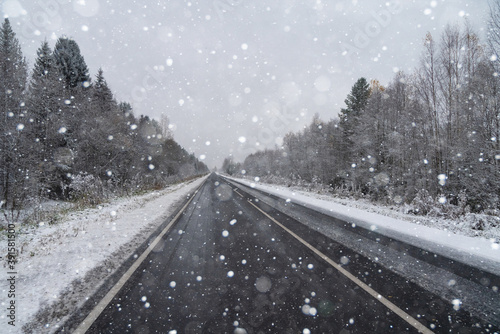 Blizzard on a winter road © scharfsinn86