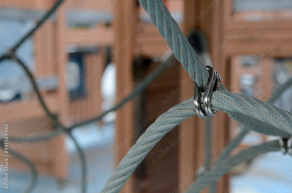Stainless clip lock with cord at detail ship playground Stainless clip lock with cord at detail ship playground