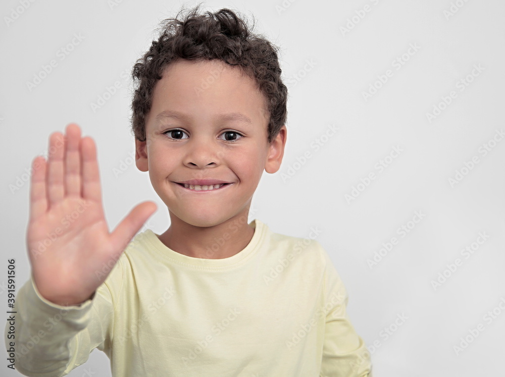 boy with hand showing stop gesture on white background stock photo boy with hand showing stop gesture on white background stock photo