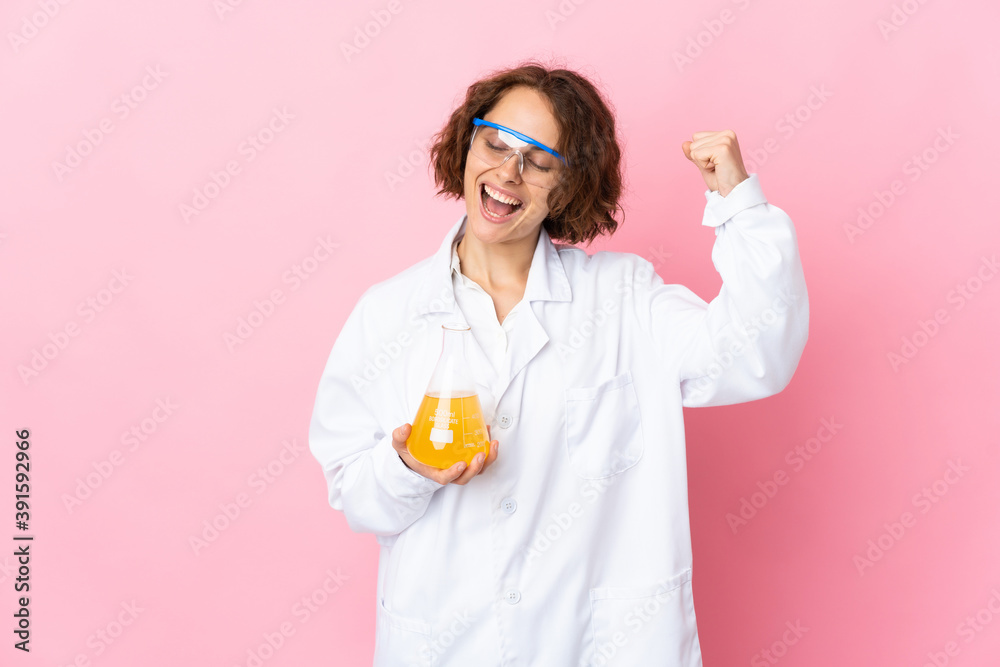 Young English scientific woman isolated on pink background celebrating a victory Young English scientific woman isolated on pink background celebrating a victory