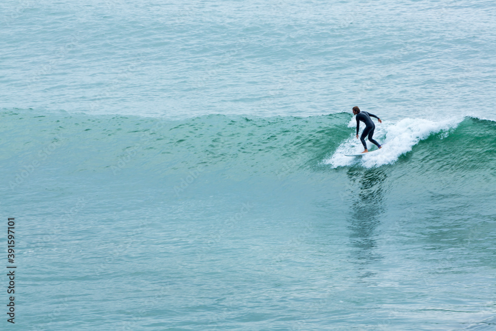 Surfer, Barrika beach, Bizkaia, Basque Country, Spain, Europe