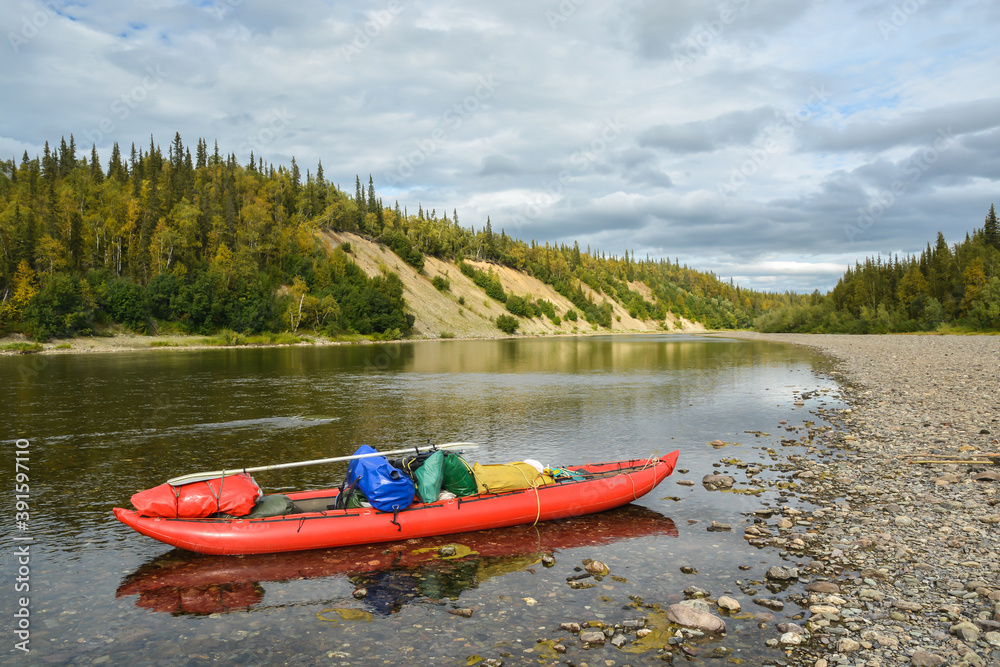 Inflatable kayak on the water. Inflatable kayak on the water.