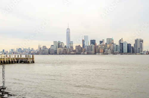 Manhattan Cityscape. Futuristic Buildings, Skyscrapers and Towers. The Largest Metropolitan Area in the World. Shot Taken from Ellis Island. New York City, USA © Nikolaos