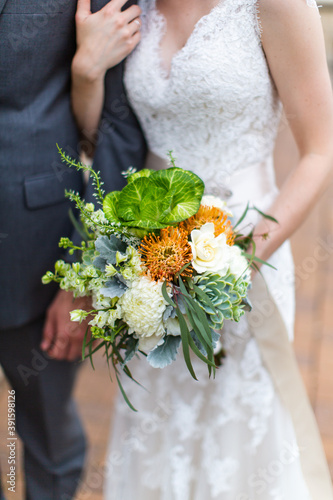 Bride and groom with flowers