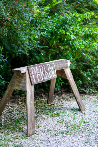 Wooden parking sign.