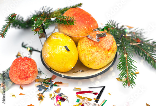 Retro vintage Soviet new year fruit made of cotton wool and paper in an old iron plate. Christmas composition.