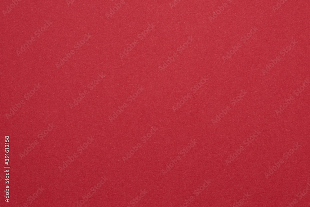 Red poster board texture. Simple pattern for background Stock