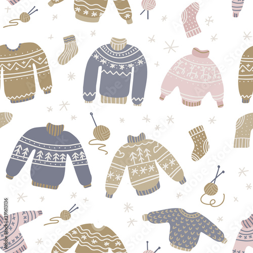 Warm winter and autumn woolen sweaters in Scandinavian style seamless pattern. Trendy flat design elements for winter clothes. Pastel ugly sweater with sockes. Flat vector illustration. photo