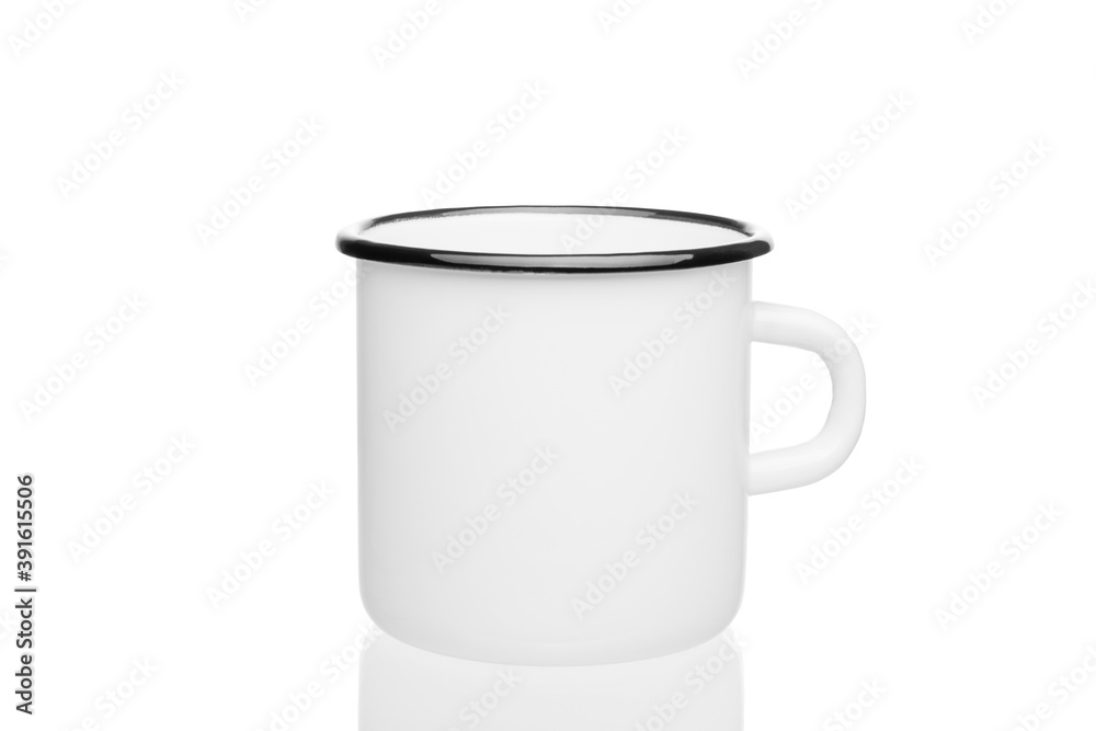 white metal mug with a black rim on a white background close-up, selective focus, reflection of the mug from below white metal mug with a black rim on a white background close-up, selective focus, reflection of the mug from below
