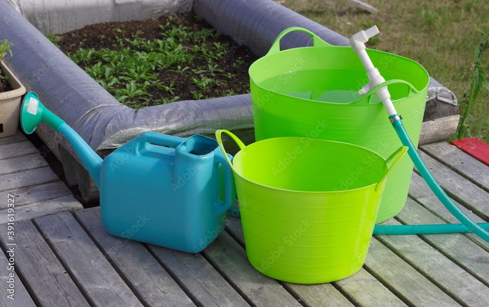 Bucket, watering can, these are all containers for watering. Bucket, watering can, these are all containers for watering.