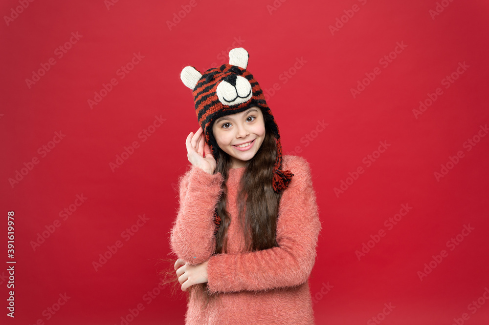 looking so cute. child in knitted sweater. happy childhood. happy teen girl wear warm clothes. feel comfortable and cozy in any weather. winter holiday and vacation. kid in hat with ear flaps looking so cute. child in knitted sweater. happy childhood. happy teen girl wear warm clothes. feel comfortable and cozy in any weather. winter holiday and vacation. kid in hat with ear flaps