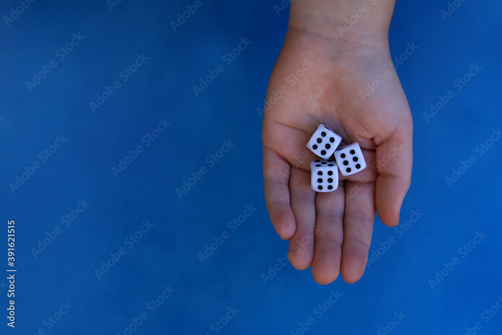 Hand holding gambling dices. Hand holding gambling dices.