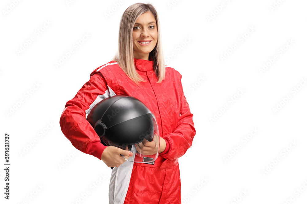 Smiling female racer holding a helmet