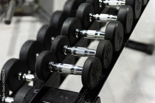 barbells weights in gym isolated