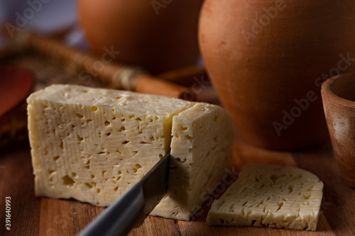 Rennet Cheese. Curd Cheese. (Queijo coalho ou Queijo de Coalho). Authentic Typical Brazilian Cheese from Northeast region. Perspective photo