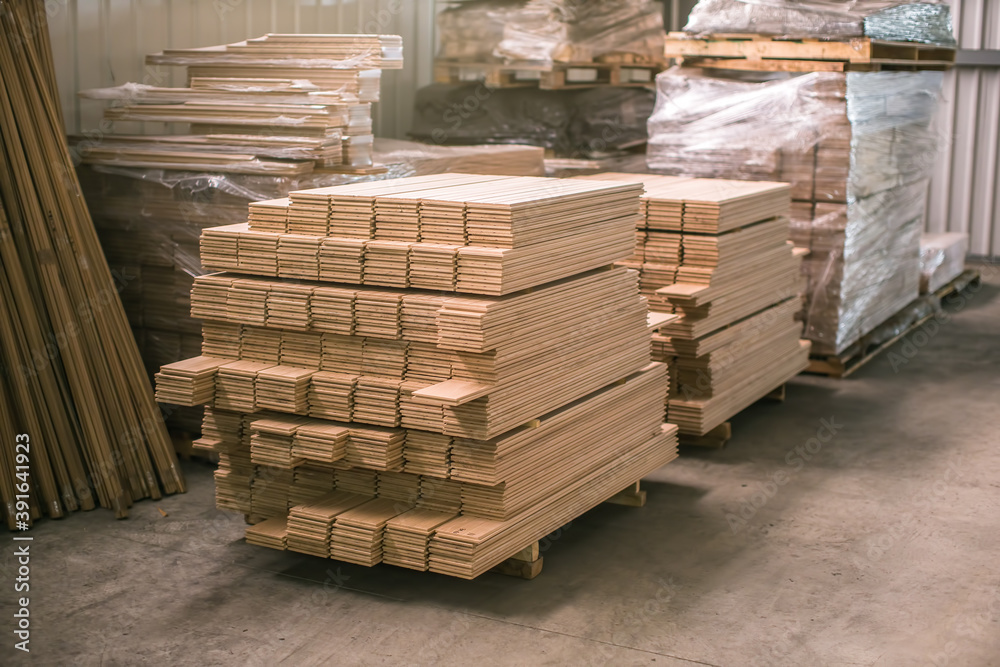 many wooden crates stacked on top of each other in factory warehouse many wooden crates stacked on top of each other in factory warehouse