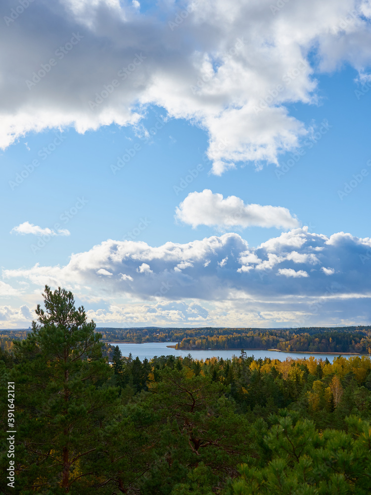 Turku archipelago on autumn time. Baltic sea coast with white clouds on sky.