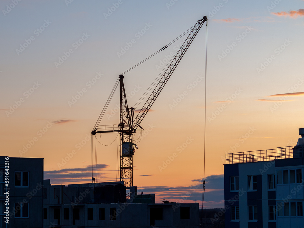 Construction crane for lifting and mounting panels, blocks in the construction of residential buildings, high-rises, skyscrapers Construction crane for lifting and mounting panels, blocks in the construction of residential buildings, high-rises, skyscrapers