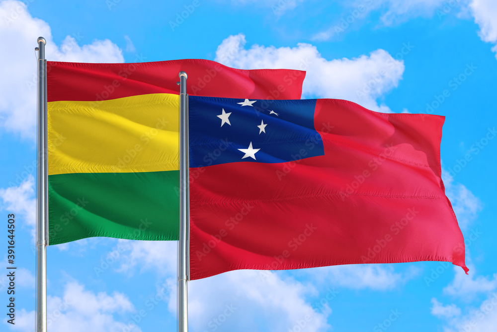 Samoa and Bolivia national flag waving in the windy deep blue sky. Diplomacy and international relations concept. Samoa and Bolivia national flag waving in the windy deep blue sky. Diplomacy and international relations concept.